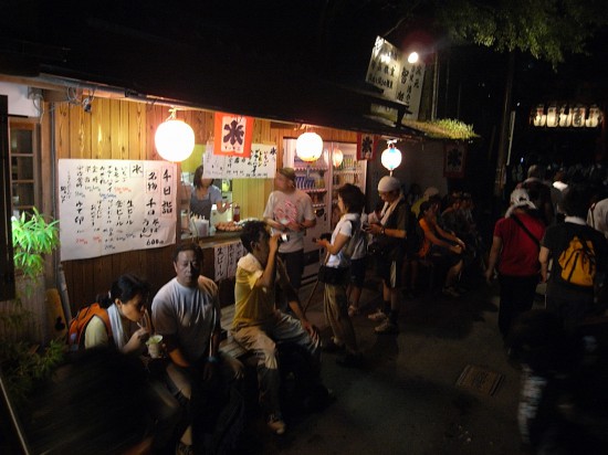 There is a vendor selling noodles and beer at the Torii gate where you started your trek.